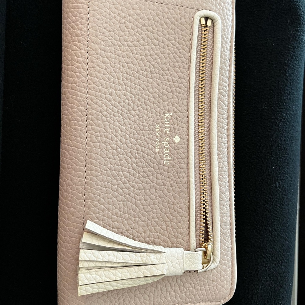 kate spade pale pink pebbled leather zip tassel wallet